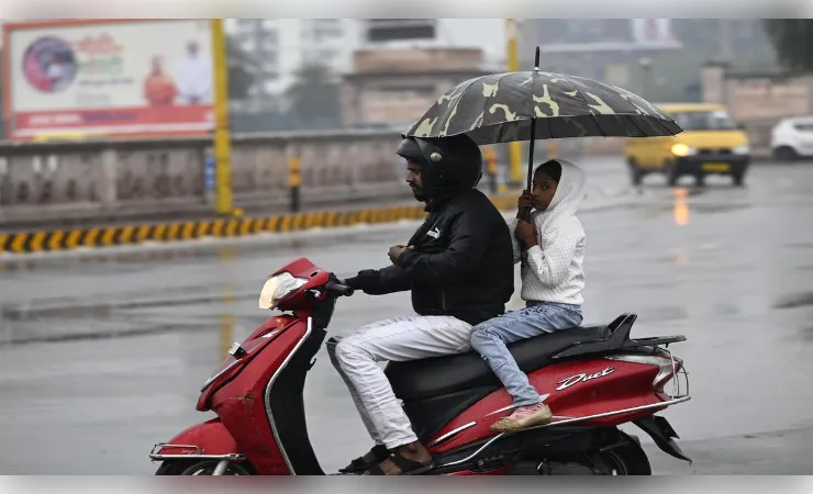 राजधानी के कई इलाकों में बारिश से मौसम सुहावना, गर्मी से मिली राहत