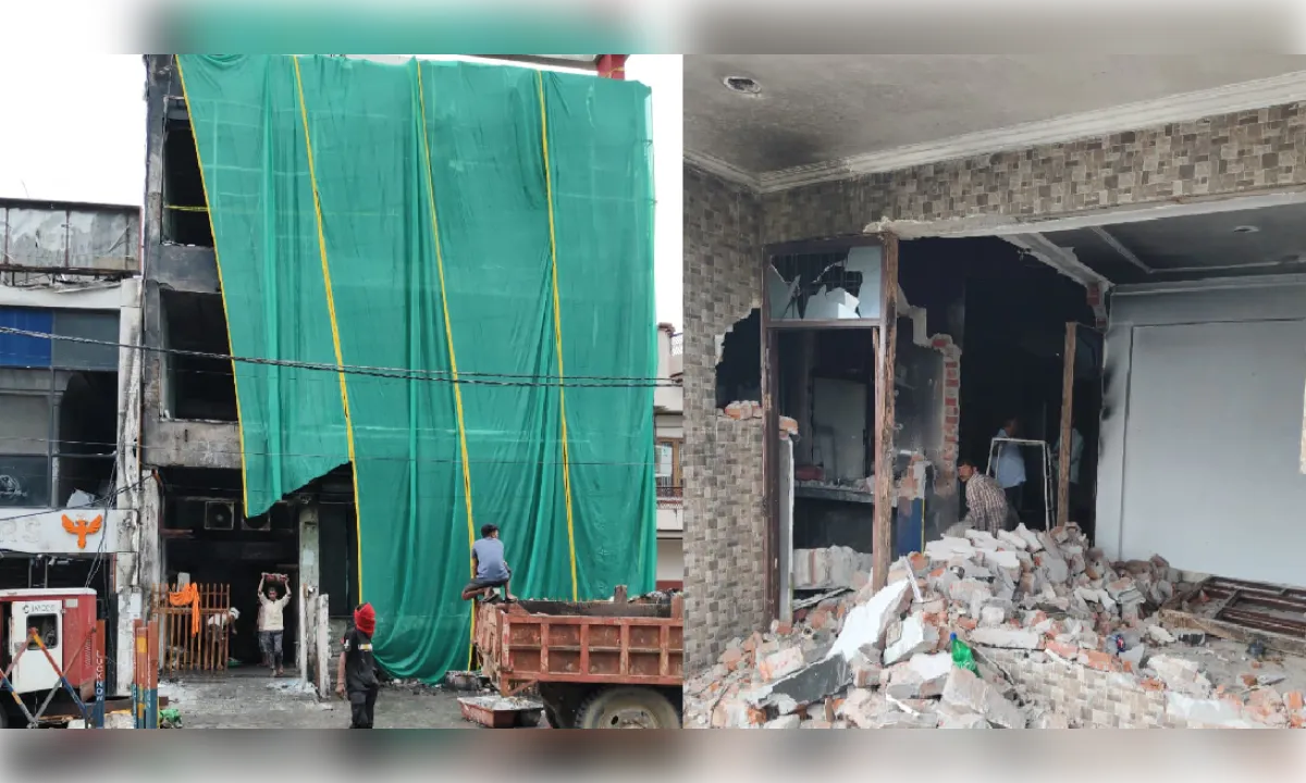 अलीगंज अग्निकांडः ध्वस्तीकरण आदेश के बाद बिल्डर ने खुद तोड़ा अवैध निर्माण