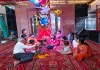 बारिश में भी कृष्ण भक्ति में डूबा गुलमोहर एनक्लेव